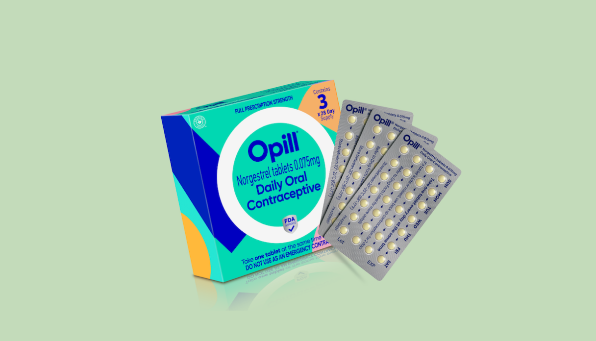 A box of Opill birth control is shown against a light green background, featuring three blister packs of daily oral contraceptive pills.